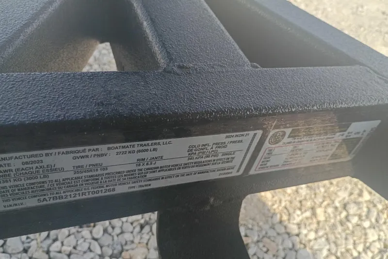 Slide: The Image of 2024 iKon LX21 trailer label with specifications and manufacturing details. - 12