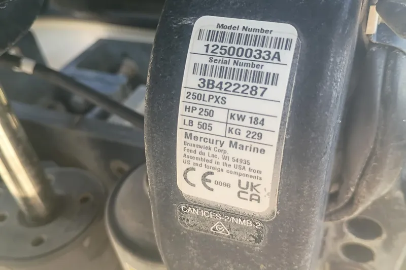 Slide: The Image of Label on Mercury Marine engine with model and serial numbers, iKon LX21, 2024. - 13