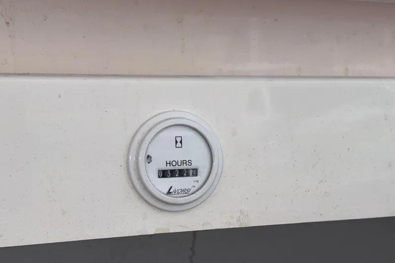 Slide: The Image of Hour meter on 2007 Fountain 38 Lightning boat, displaying 322.6 hours. - 12