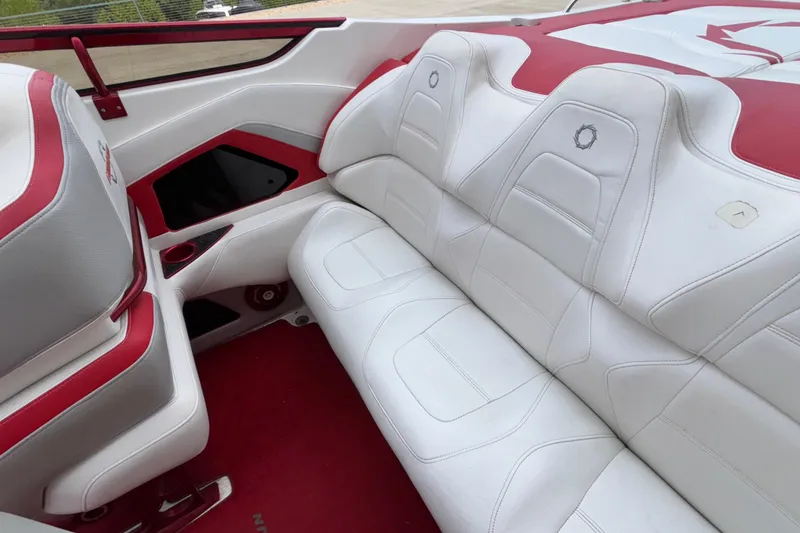Slide: The Image of 2007 Fountain 38 Lightning boat interior with white and red seating. - 16