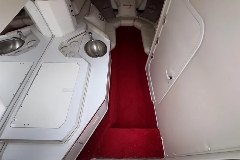 Slide: The Image of Interior of 2007 Fountain 38 Lightning boat with red carpet and white seating. - 28