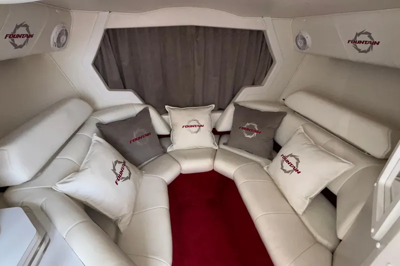 Slide: The Image of Luxurious interior of 2007 Fountain 38 Lightning boat with plush seating and branded cushions. - 34