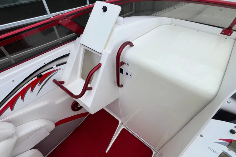 Slide: The Image of 2007 Fountain 38 Lightning boat interior with red accents and sleek design. - 42