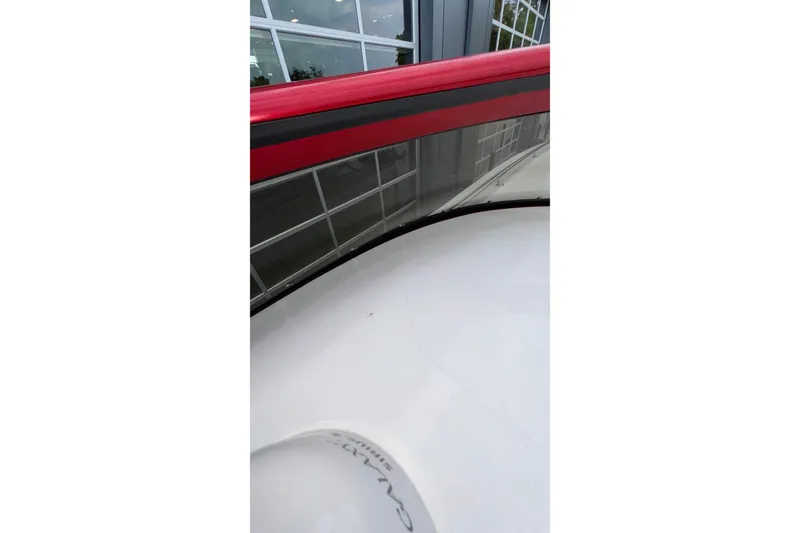 Slide: The Image of 2007 Fountain 38 Lightning boat with red and black detailing, exterior view. - 44