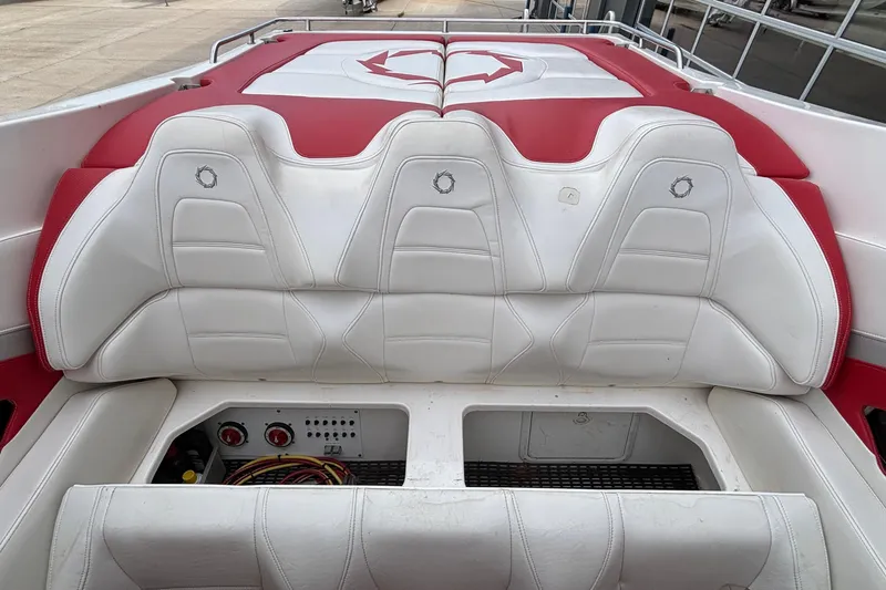 Slide: The Image of 2007 Fountain 38 Lightning boat interior with white and red seating. - 6