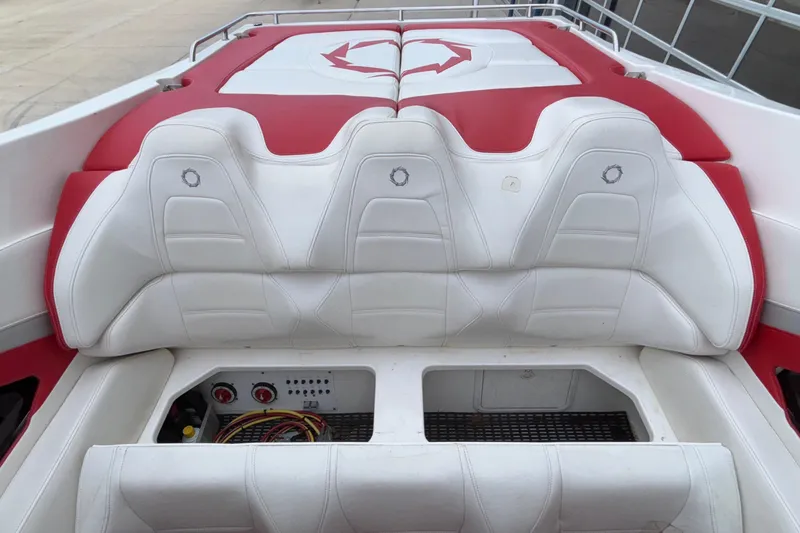Slide: The Image of 2007 Fountain 38 Lightning boat interior with white and red seating. - 7