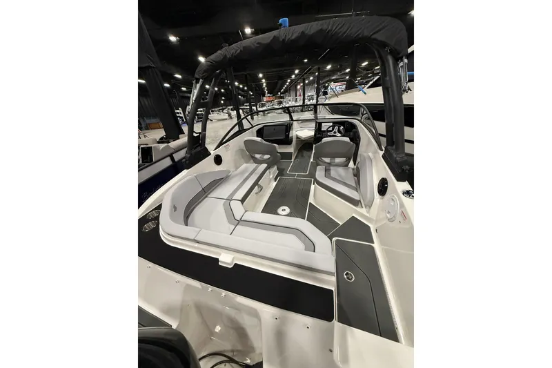 Slide: The Image of 2026 Bayliner V20 boat interior with modern seating and sleek design. - 9