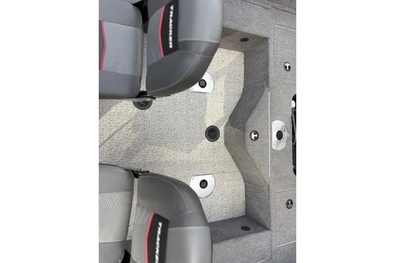 Slide: The Image of 2023 Tracker Pro Guide V-16 SC boat interior with gray seating and carpeted flooring. - 11