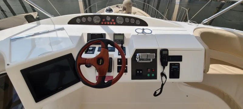Slide: The Image of Helm of the 2006 Viking Princess 61 Flybridge. - 11