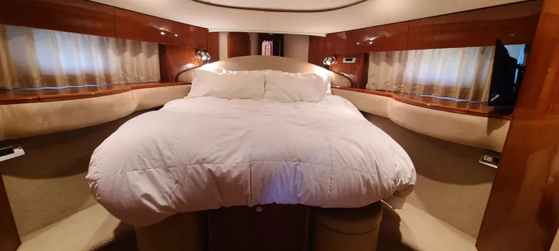Slide: The Image of Luxurious bedroom on a 2006 Viking Princess 61 Flybridge yacht. - 3