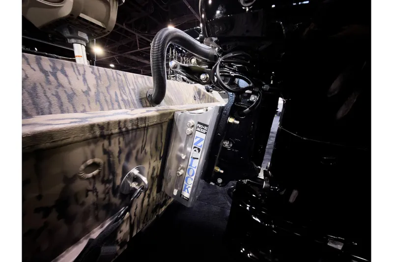 Slide: The Image of 2026 Excel 220 Bay Pro Elite boat engine detail with camouflage design. - 21