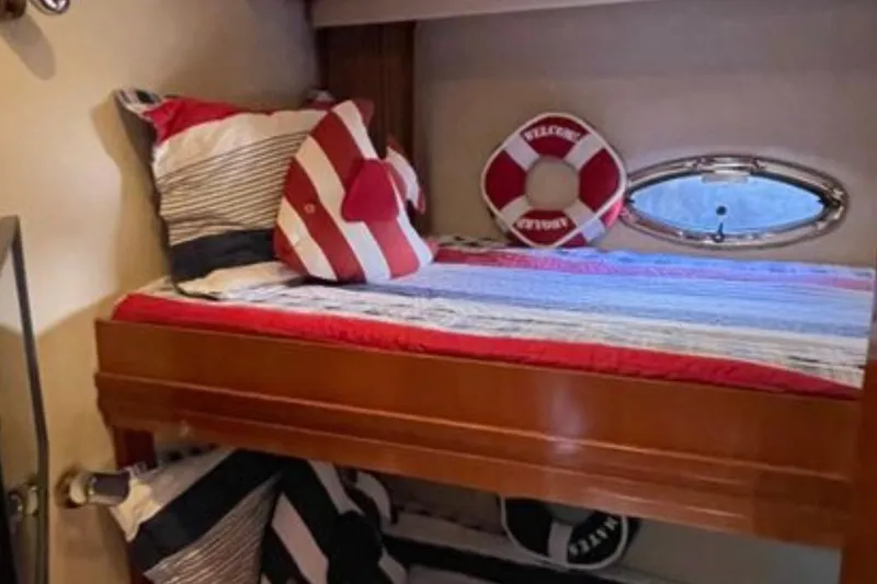 Slide: The Image of Bunk bed with nautical decor in 2005 Carver 56 Voyager yacht cabin. - 24