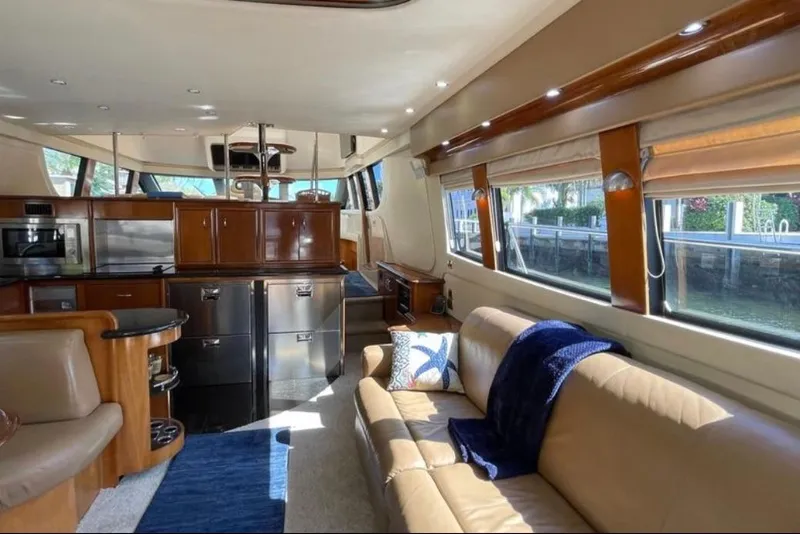 Slide: The Image of Luxurious interior of a 2005 Carver 56 Voyager yacht with elegant furnishings and modern amenities. - 6