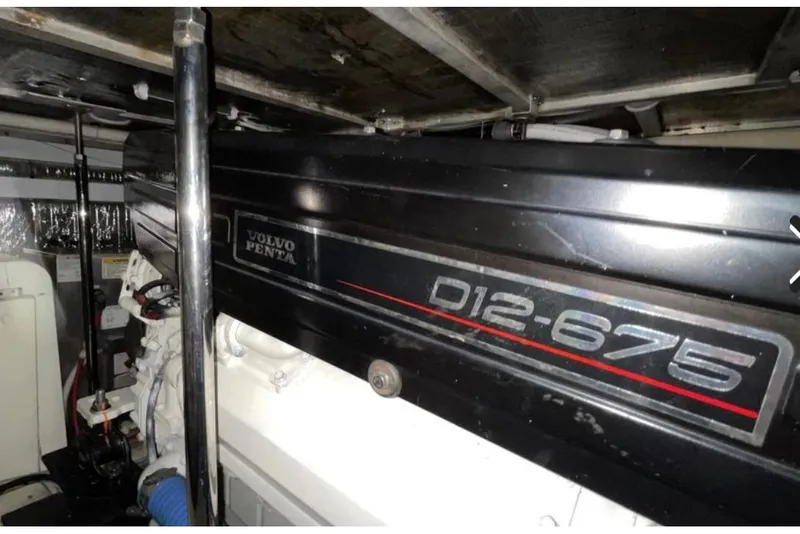 Slide: The Image of Engine room of 2005 Carver 56 Voyager with Volvo Penta D12-675 engine. - 28