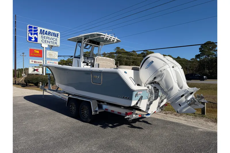 Slide: The Image of 2026 Sea Hunt Ultra 275 Coffin Box boat on trailer at Marine Service Center. - 4
