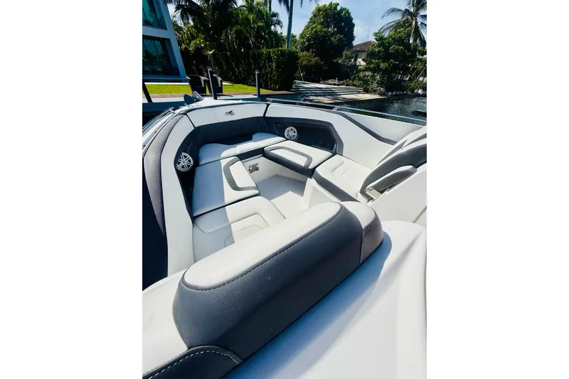 Slide: The Image of 2020 Monterey 328SS Super Sport boat interior with luxurious seating and sleek design. - 27