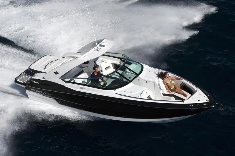 Slide: The Image of Manufacturer Provided Image: 2020 Monterey 328SS Super Sport boat cruising on open water with passengers. - 3