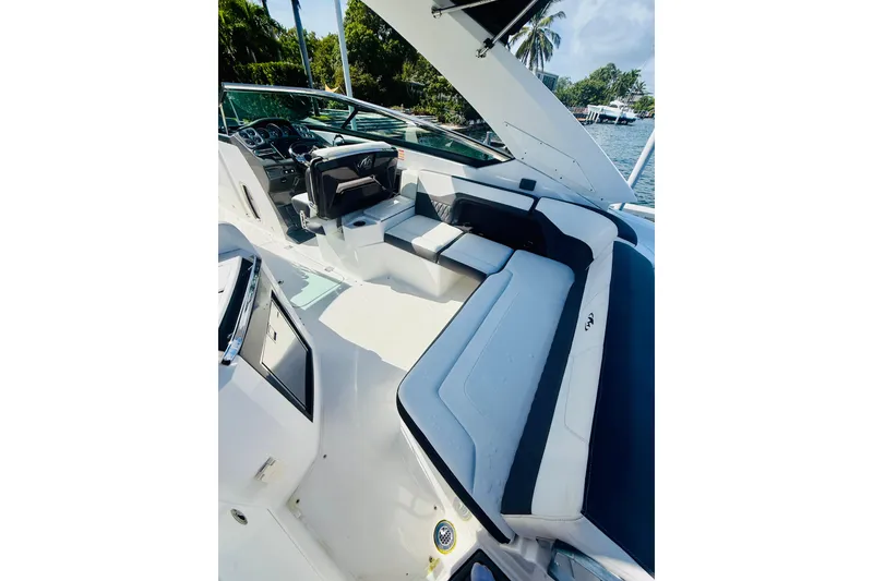 Slide: The Image of 2020 Monterey 328SS Super Sport boat interior with sleek seating and modern dashboard. - 33