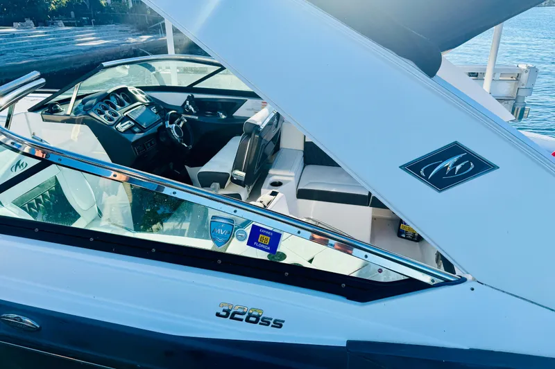 Slide: The Image of 2020 Monterey 328SS Super Sport boat interior with sleek design and modern dashboard. - 7
