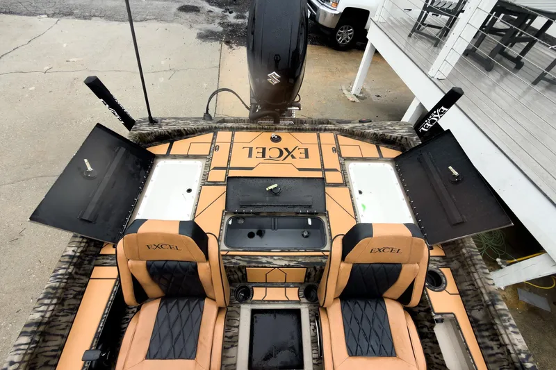 Slide: The Image of 2026 Excel EX203C Crappie & Bass boat with Millennium Marine seating, detailed deck design. - 21