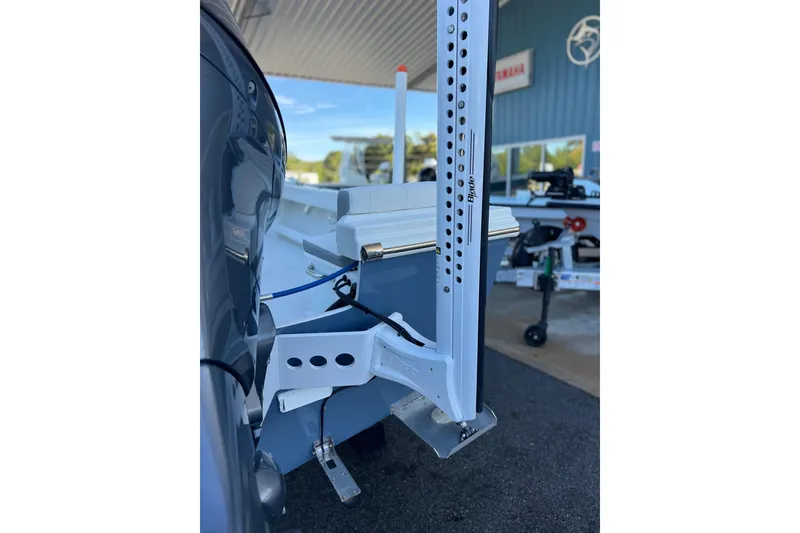 Slide: The Image of 2023 Parker 1801 Center Console boat with Power-Pole anchor system in a showroom. - 15