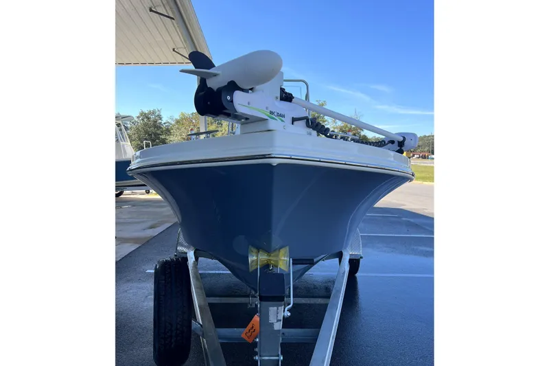Slide: The Image of 2023 Parker 1801 Center Console boat on trailer under a canopy. - 24