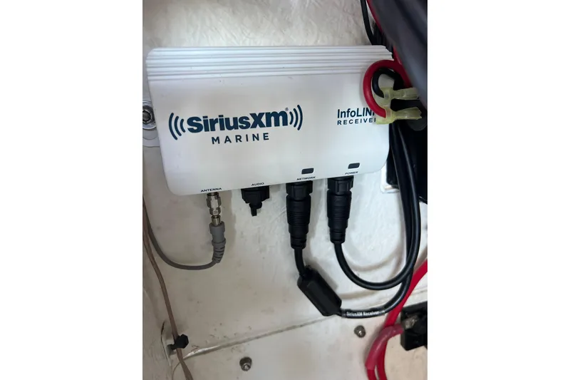 Slide: The Image of SiriusXM Marine InfoLINK receiver installed on 2023 Parker 1801 Center Console boat. - 4