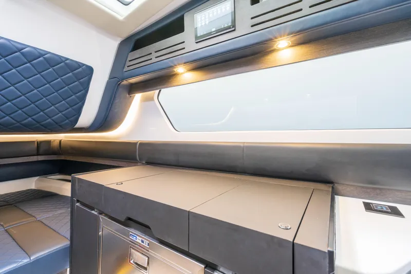 Slide: The Image of Manufacturer Provided Image: 2024 Cigarette 59 Tirranna interior cabin with modern amenities and sleek design. - 10