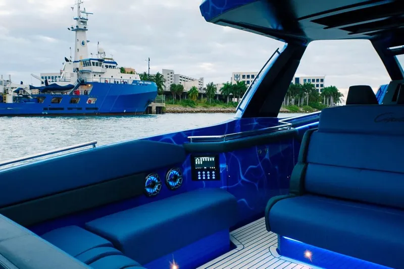 Slide: The Image of Luxurious interior of 2024 Cigarette 59 Tirranna yacht with modern seating and ambient lighting. - 20