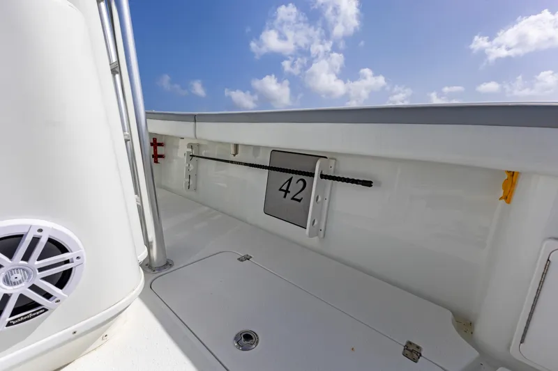 Slide: The Image of 2018 Yellowfin 42 Offshore boat interior with speaker and number 42 displayed. - 21