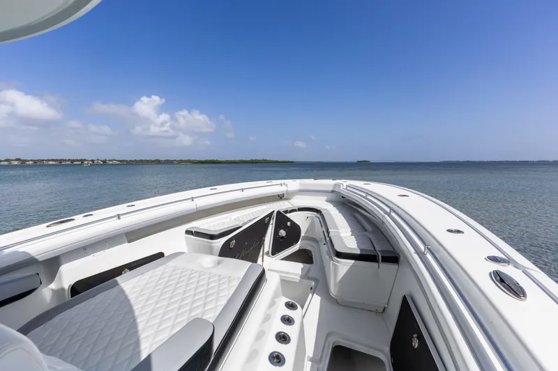 Slide: The Image of 2018 Yellowfin 42 Offshore boat interior with ocean view and clear blue sky. - 27