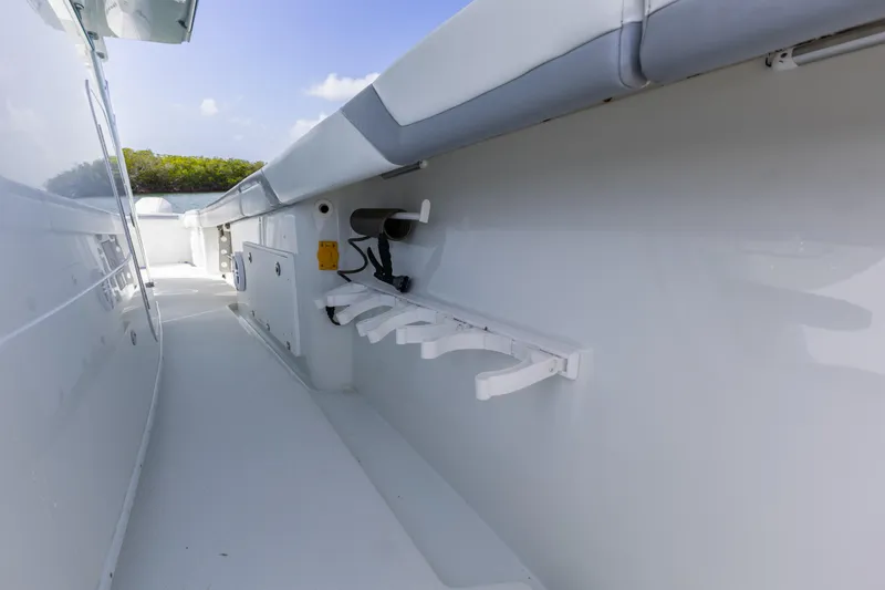 Slide: The Image of 2018 Yellowfin 42 Offshore boat interior with rod holders and sleek design. - 30