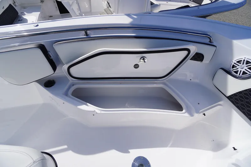 Slide: The Image of 2026 Tidewater 220 LXF boat interior storage compartment with sleek design and modern features. - 13