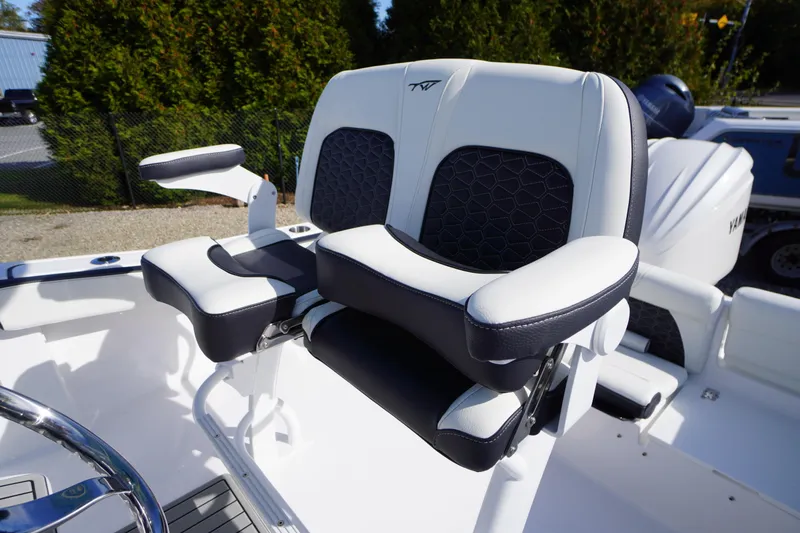 Slide: The Image of 2026 Tidewater 220 LXF boat seat with armrests, featuring modern design and comfort. - 33