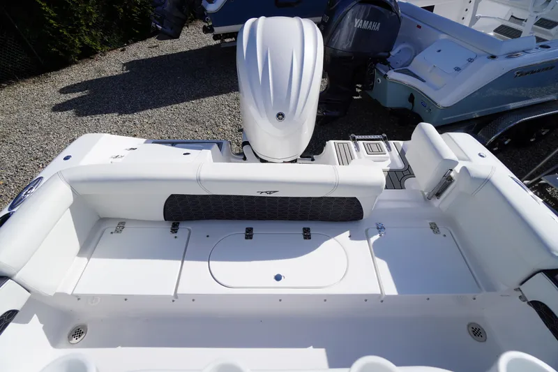 Slide: The Image of 2026 Tidewater 220 LXF boat interior with Yamaha engine, featuring spacious seating and storage. - 42