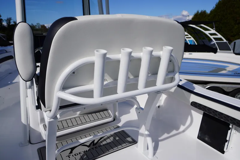 Slide: The Image of 2026 Tidewater 220 LXF boat interior with rod holders and seating. - 46