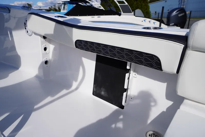 Slide: The Image of 2026 Tidewater 220 LXF boat interior with sleek seating and modern design. - 49