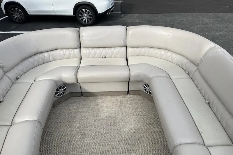 Slide: The Image of Luxurious interior of 2014 Bennington 2575 RCW pontoon boat with plush seating and modern design. - 15