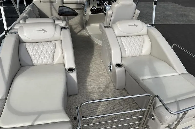 Slide: The Image of 2014 Bennington 2575 RCW boat lounge seat with cup holder and speaker. - 9