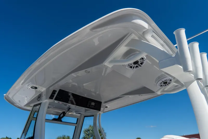 Slide: The Image of Tidewater 3100 Carolina Bay 2026 boat top view with speakers and rod holders. - 24