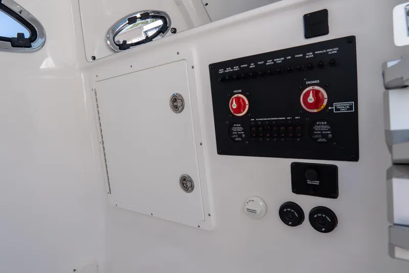 Slide: The Image of Control panel of 2026 Tidewater 3100 Carolina Bay boat interior. - 41
