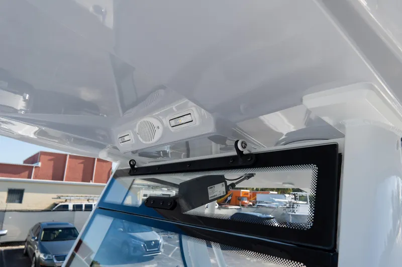 Slide: The Image of 2026 Tidewater 3100 Carolina Bay boat interior with speaker and lighting features. - 59