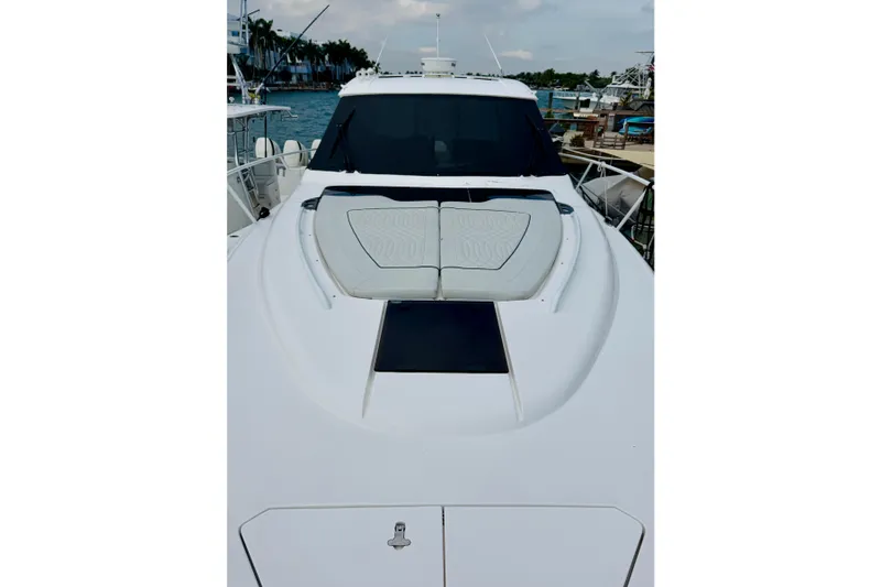 Slide: The Image of 2021 Intrepid 410 Evolution yacht with sleek design and spacious deck. - 5