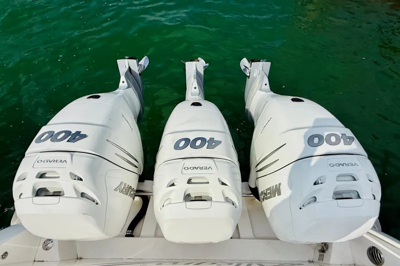 Slide: The Image of Triple Mercury 400 outboard engines on a 2021 Intrepid 410 Evolution boat. - 54