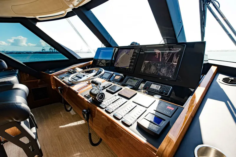 Slide: The Image of Luxurious 2020 Viking 72 yacht helm with advanced navigation and control systems. - 3