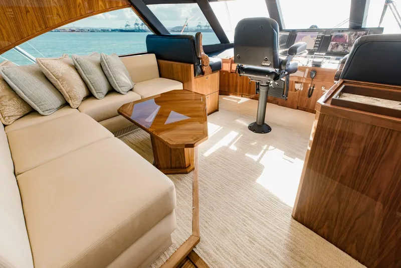 Slide: The Image of Luxurious interior of 2020 Viking 72 yacht with plush seating and modern helm. - 48