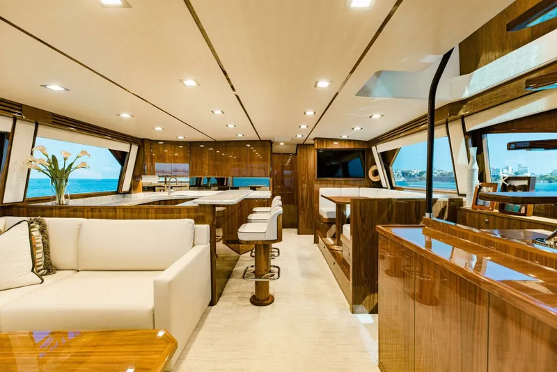 Slide: The Image of Luxurious interior of 2020 Viking 72 yacht with elegant wood finishes and modern furnishings. - 5