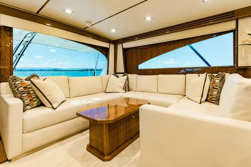 Slide: The Image of Luxurious interior of 2020 Viking 72 yacht with elegant seating and ocean view. - 6