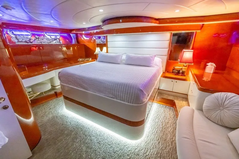 Slide: The Image of Luxurious bedroom interior of 2003 Johnson 87' Motor Yacht with modern lighting. - 49