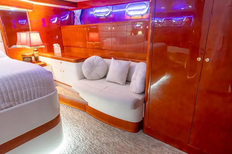Slide: The Image of Luxurious cabin interior of 2003 Johnson 87' Motor Yacht with elegant wood finish. - 51
